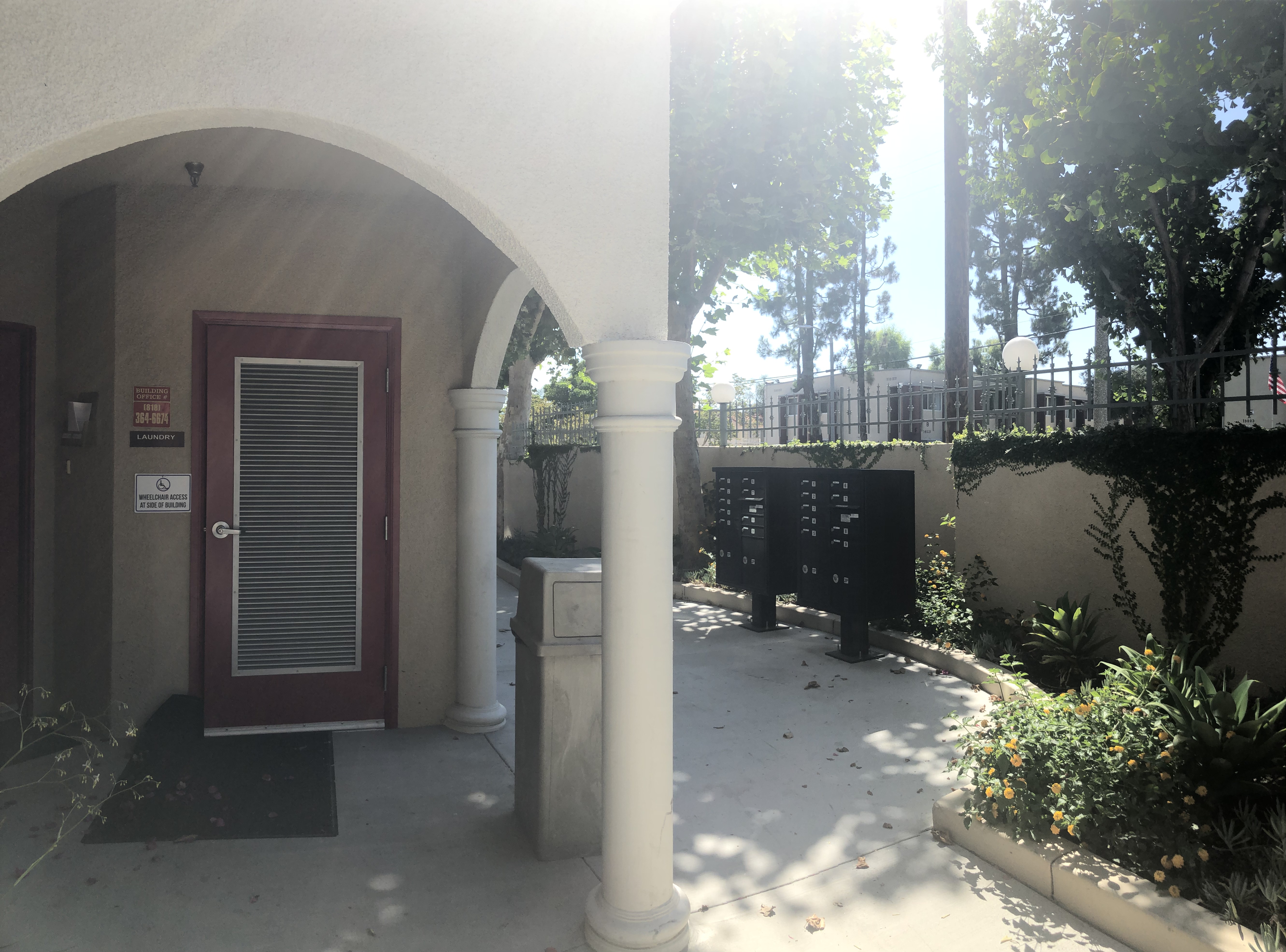 View of the laundry room entrance and the mail box