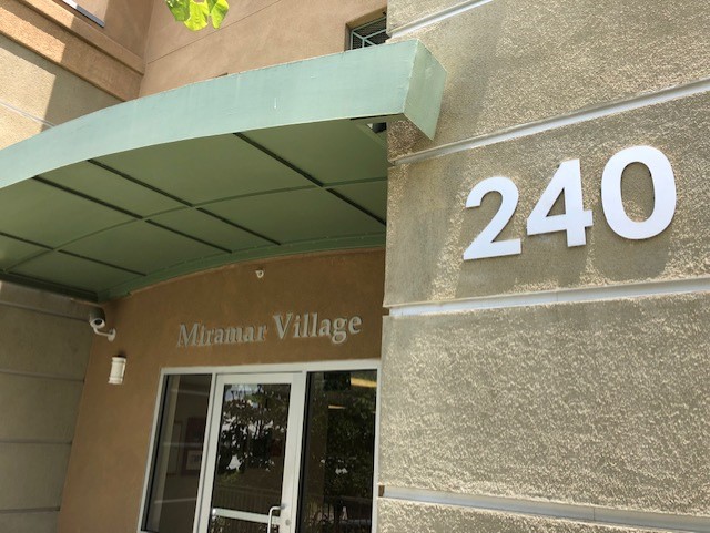 View of the entrance of Miramar Village Apartments