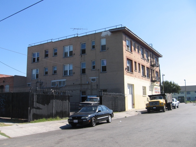 Three story building with gated parking,