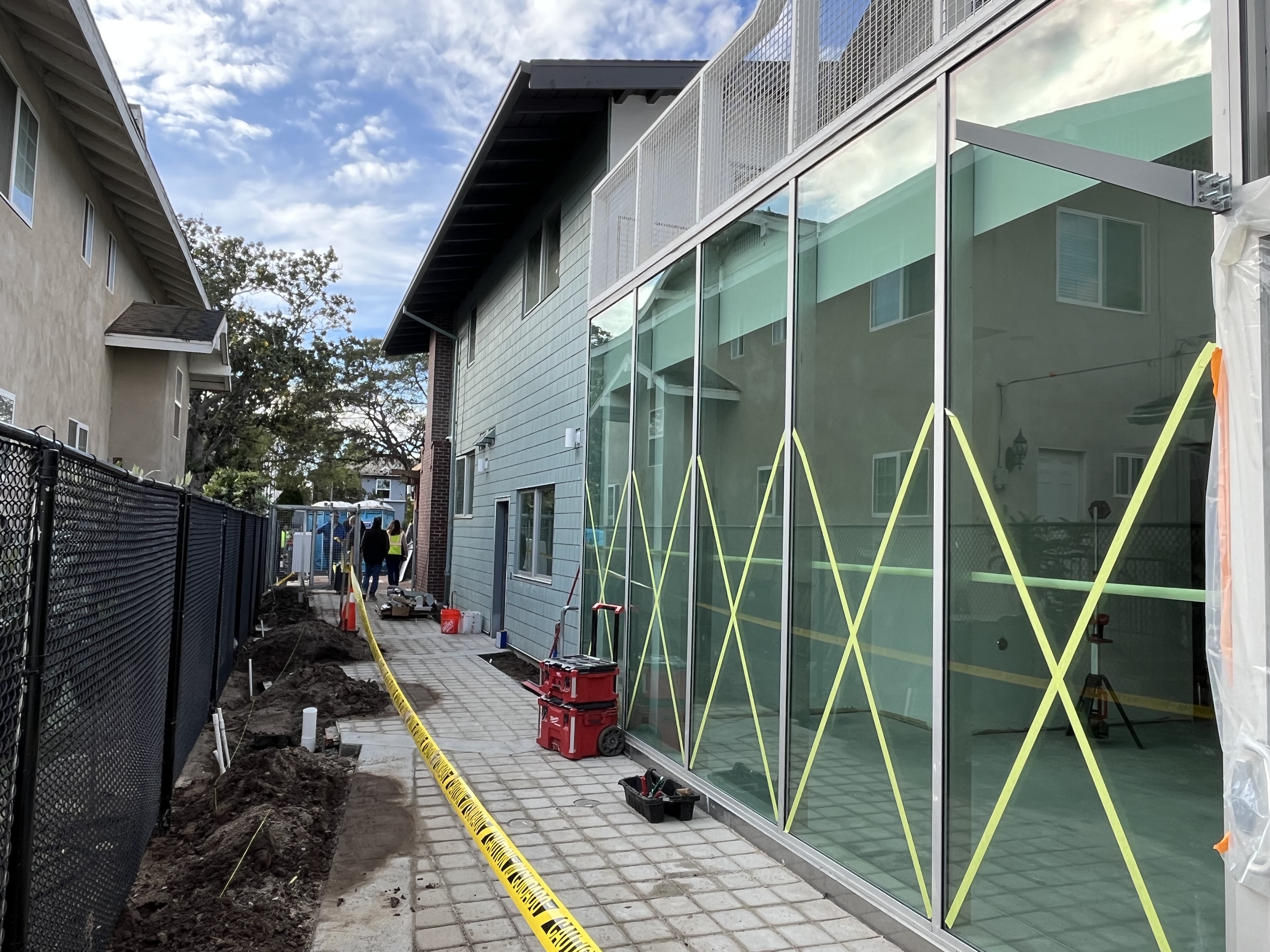  Side view of building with view of Community room entry.