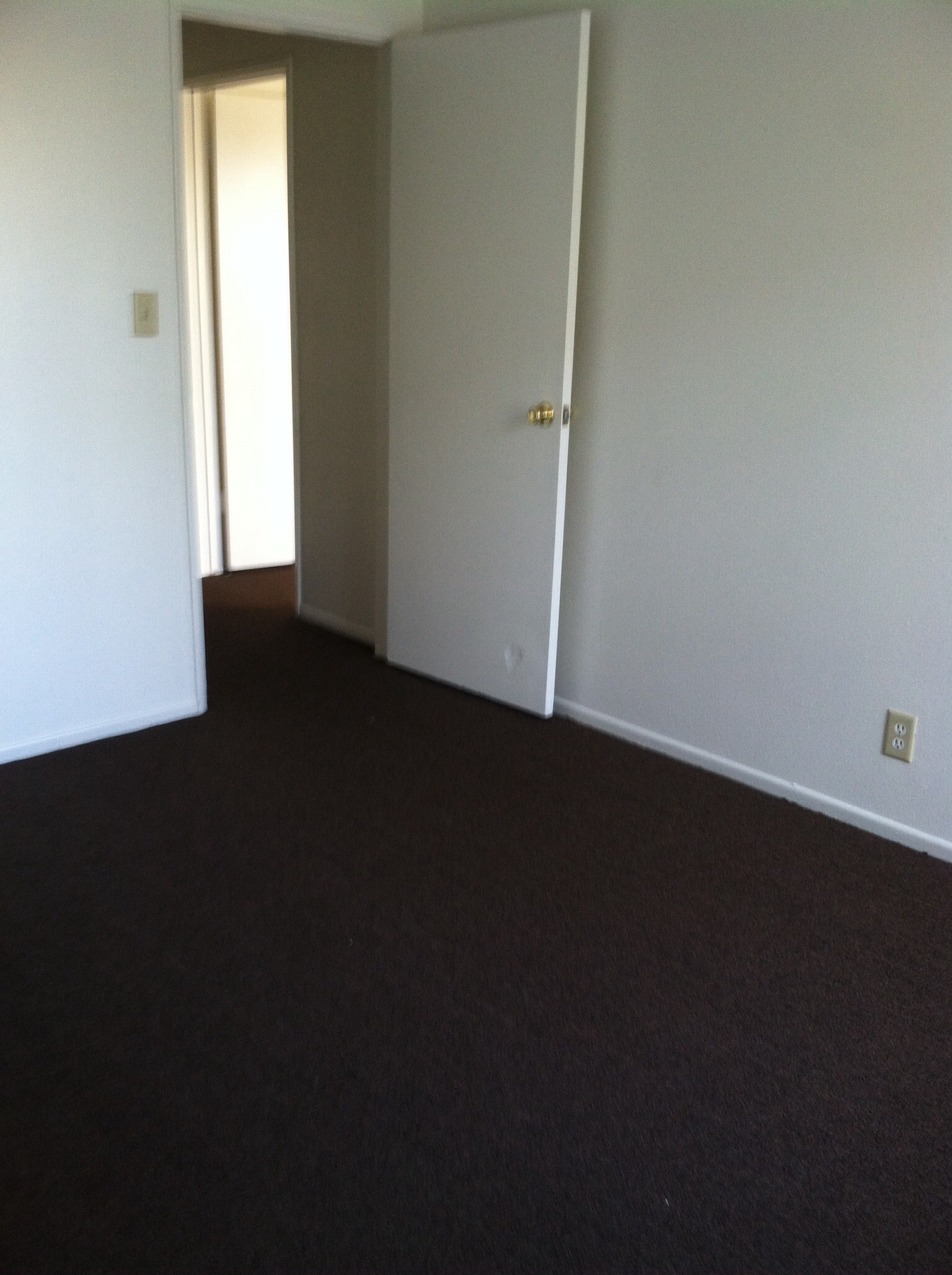 Interior view of an empty room in a unit at Ingram Preservation Properties