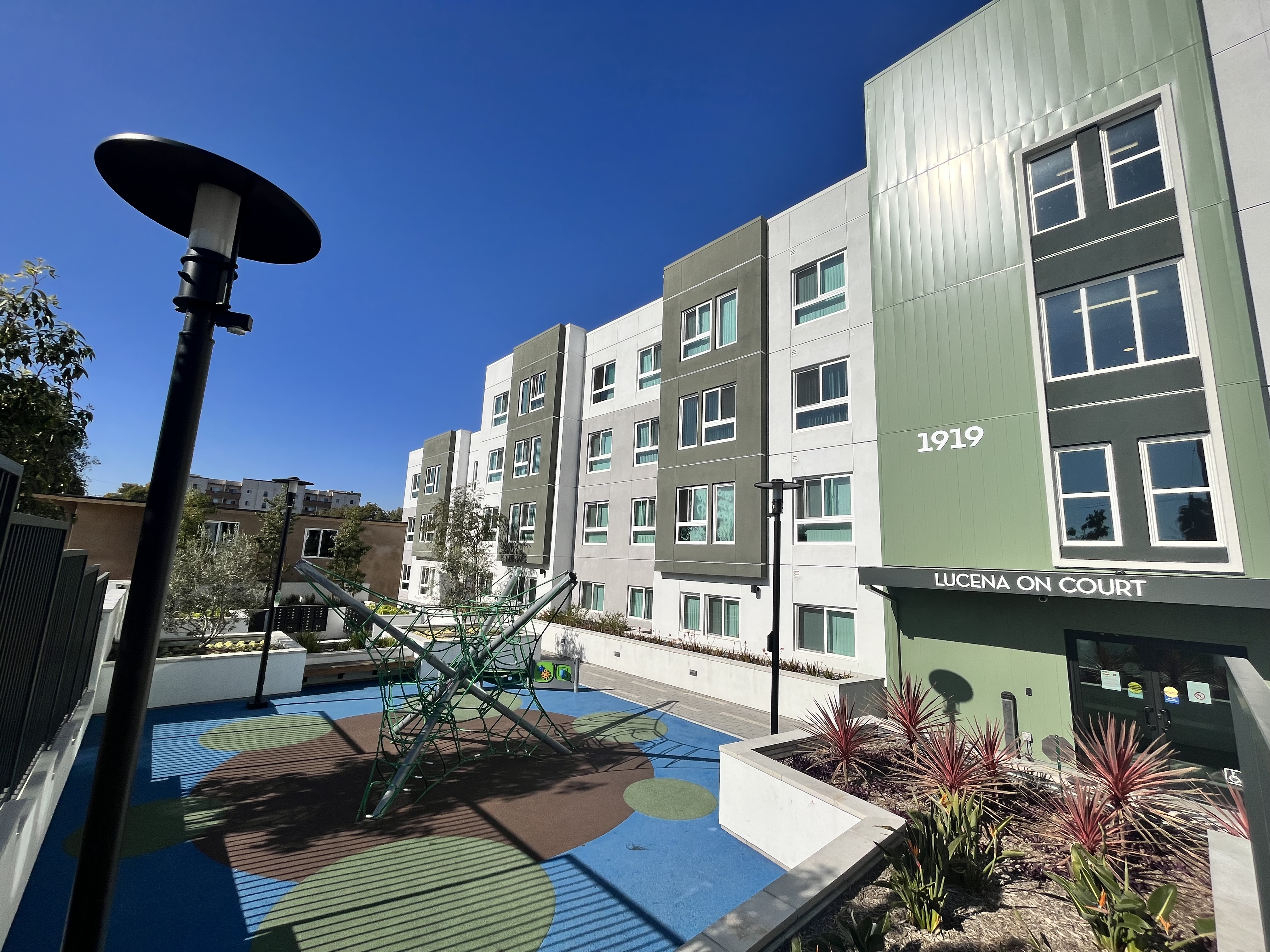 The outdoor playground, located near the main entrance to the building.