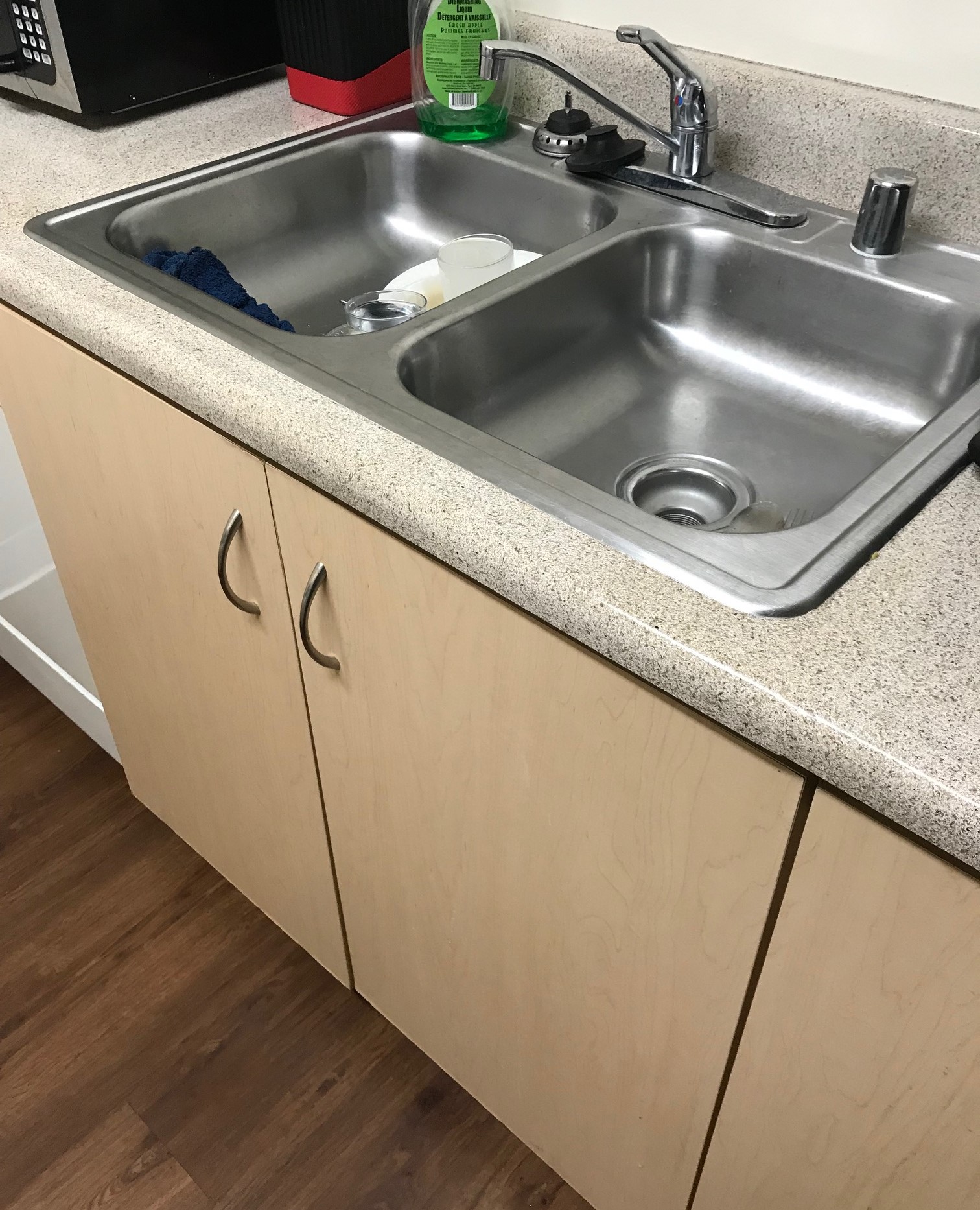 Close-up view of a kitchen sink in a unit at Lorena Terrace