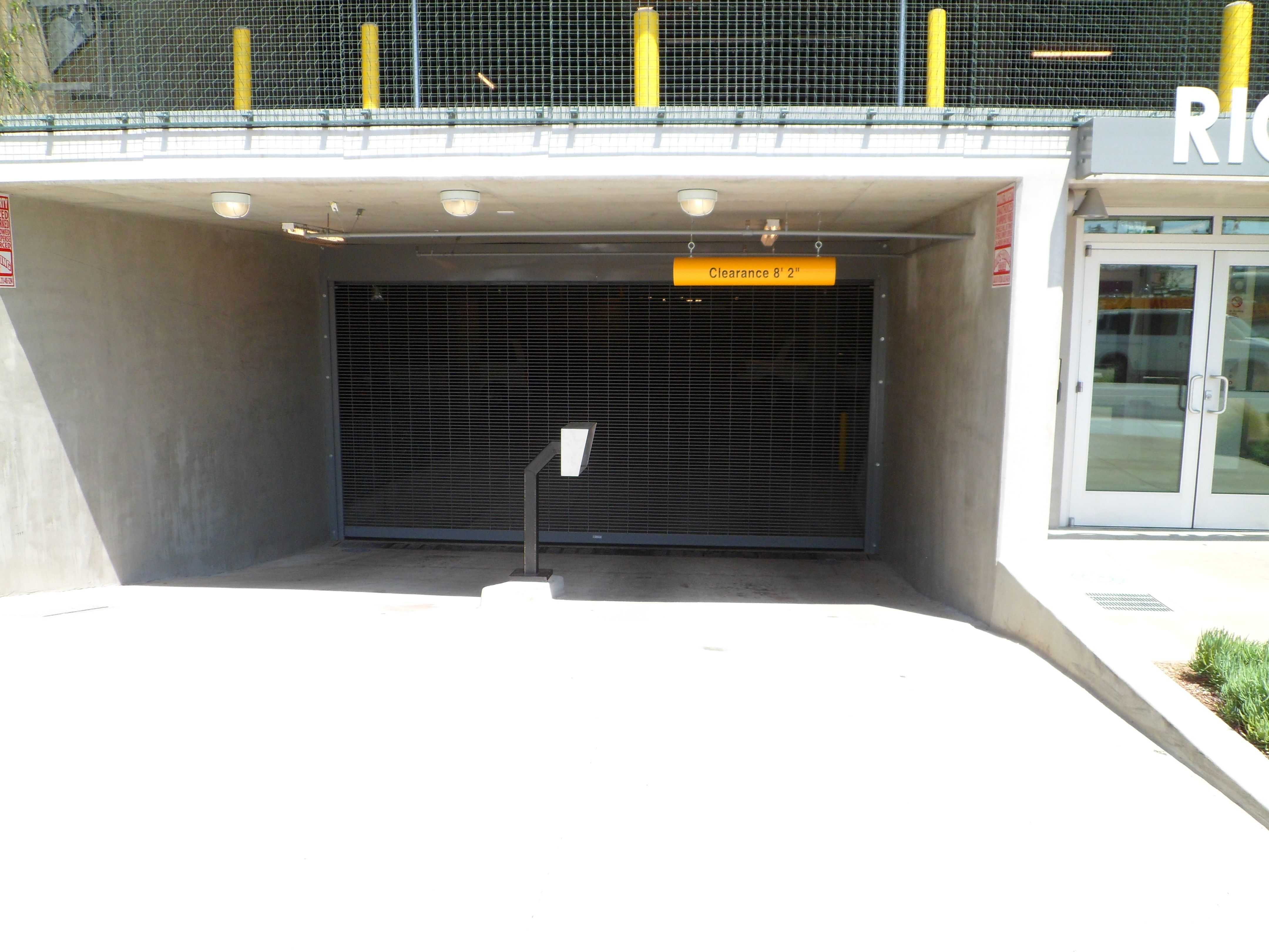 Close-up view of the underground gated parking for Rio Visa Apartments.