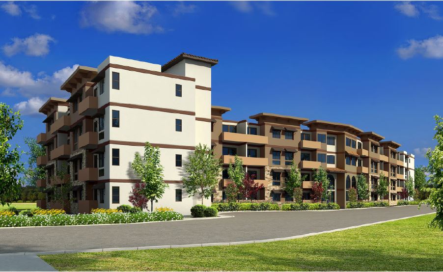 Image of Sun Valley Senior Veterans Apartments showing 4 story multicolored building with landscaping