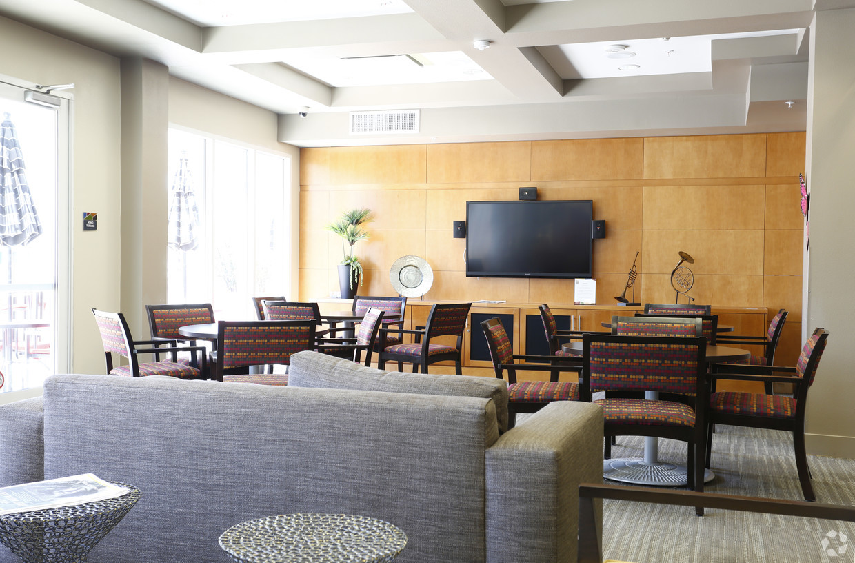 Image of the lounge equipped with a tv and furniture