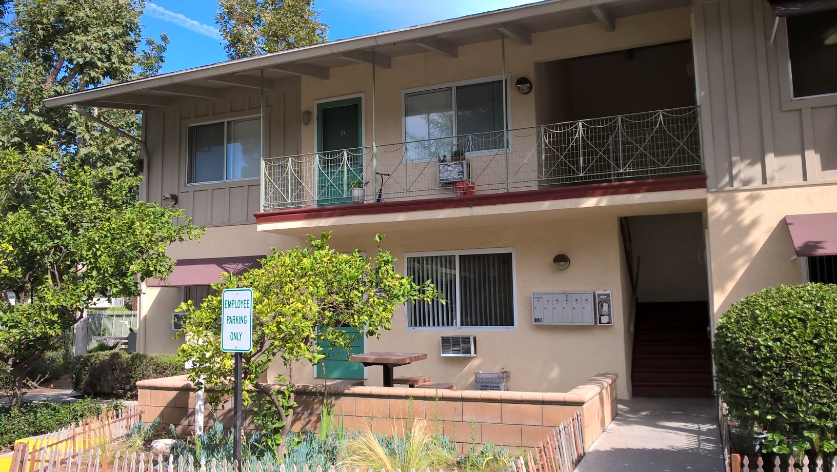 Front view of a one story apartment building