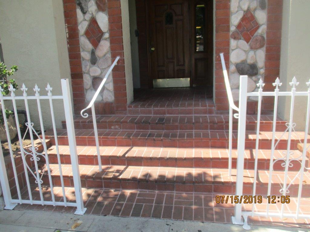 close up view of an entance to the property with steps leading to the front door