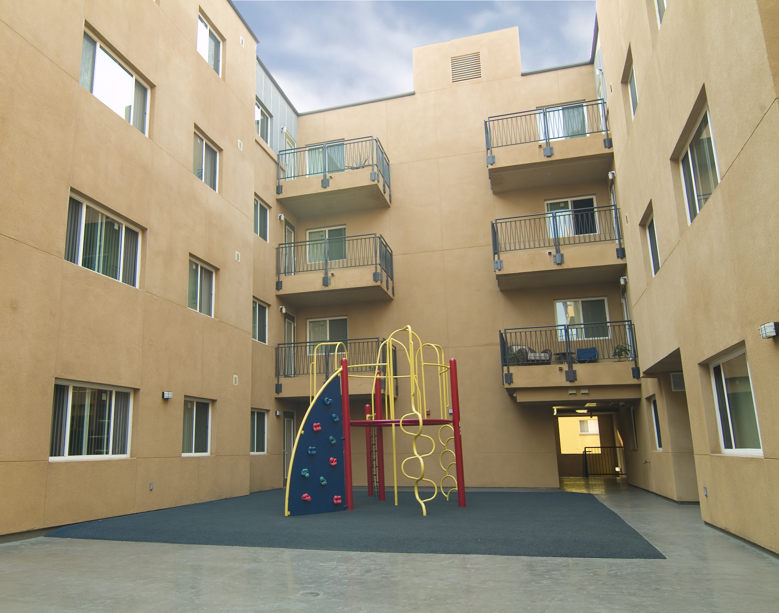 Exterior view of a playground area at James Wood Apartments