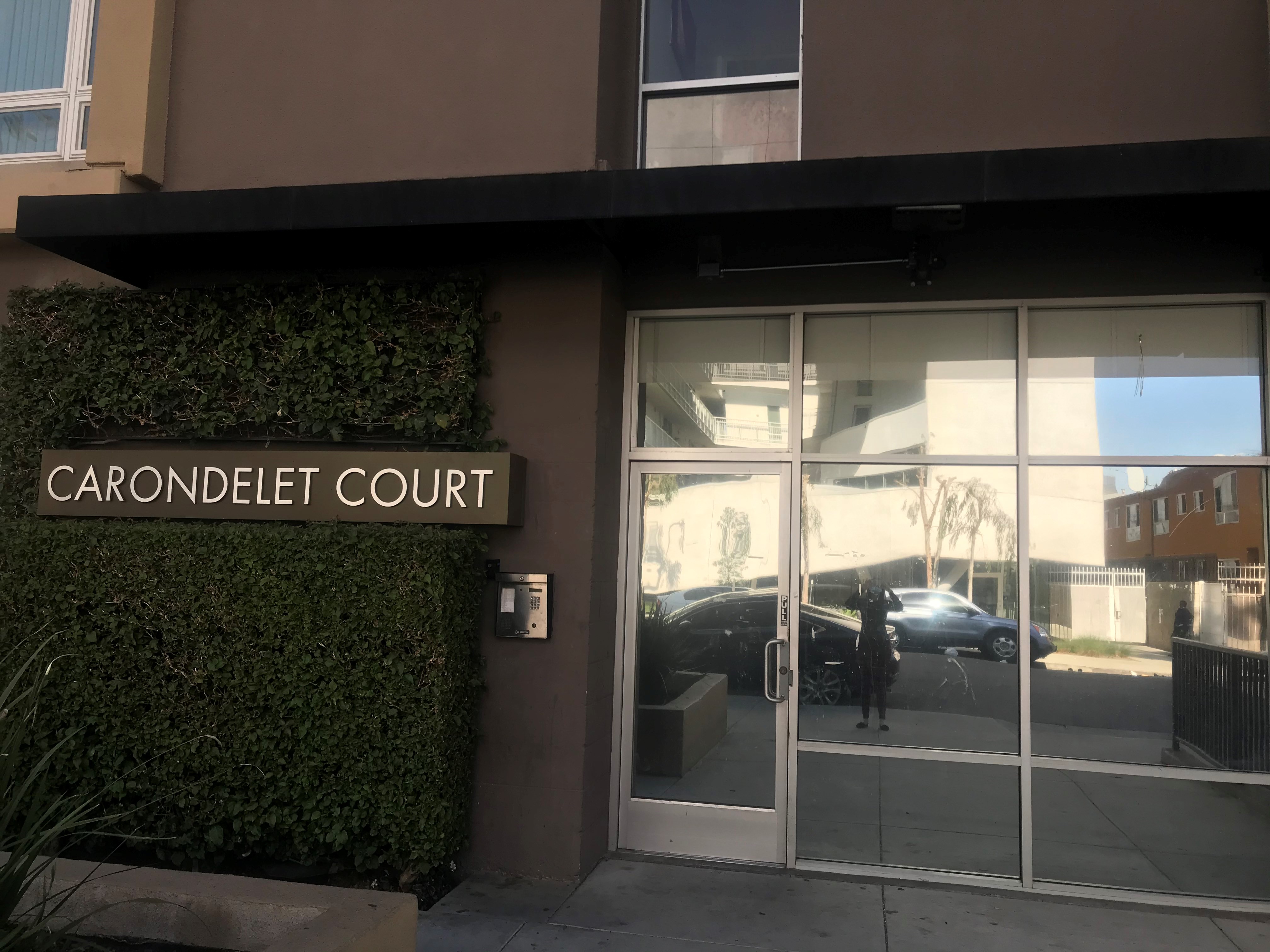 Carondelet Court front entrance, lobby, laundry room and 1st floor parking garage.