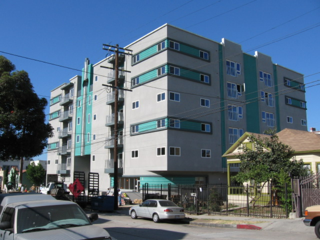 The Ardmore is a blue and gray building with 47 units family building.