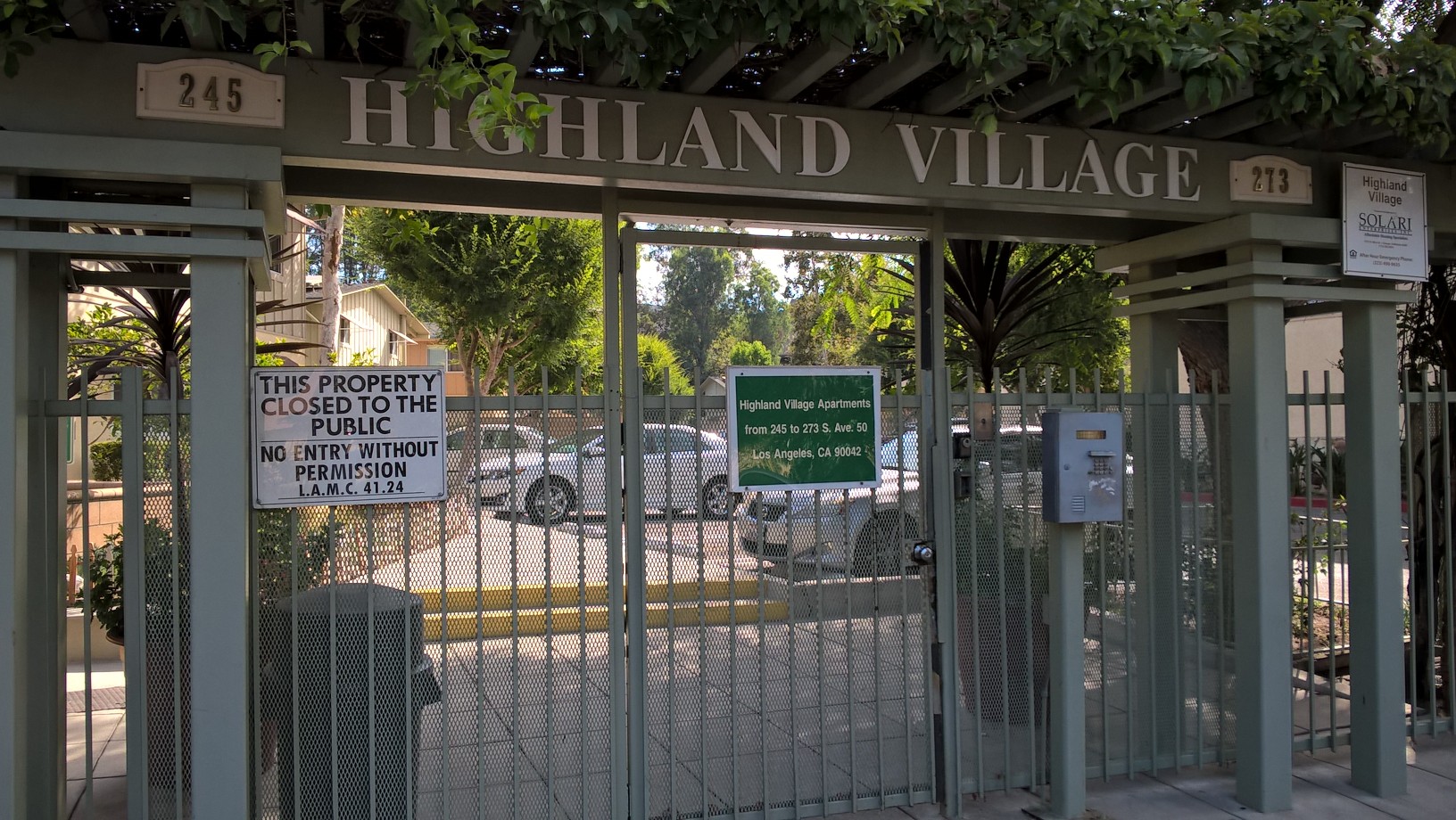 Street entrance of the Highland Village apartment