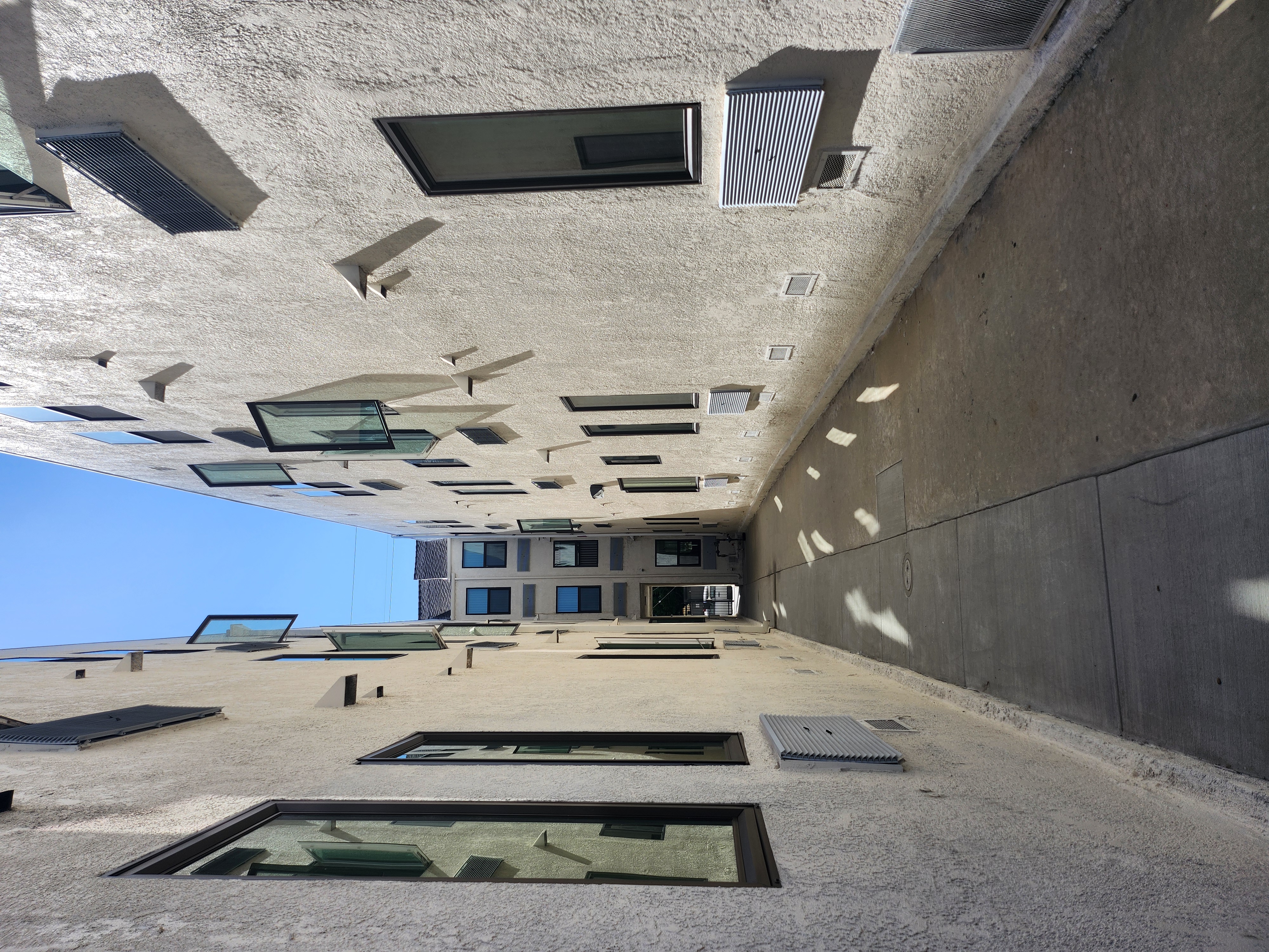 View of the exterior hallway that divides both buildings