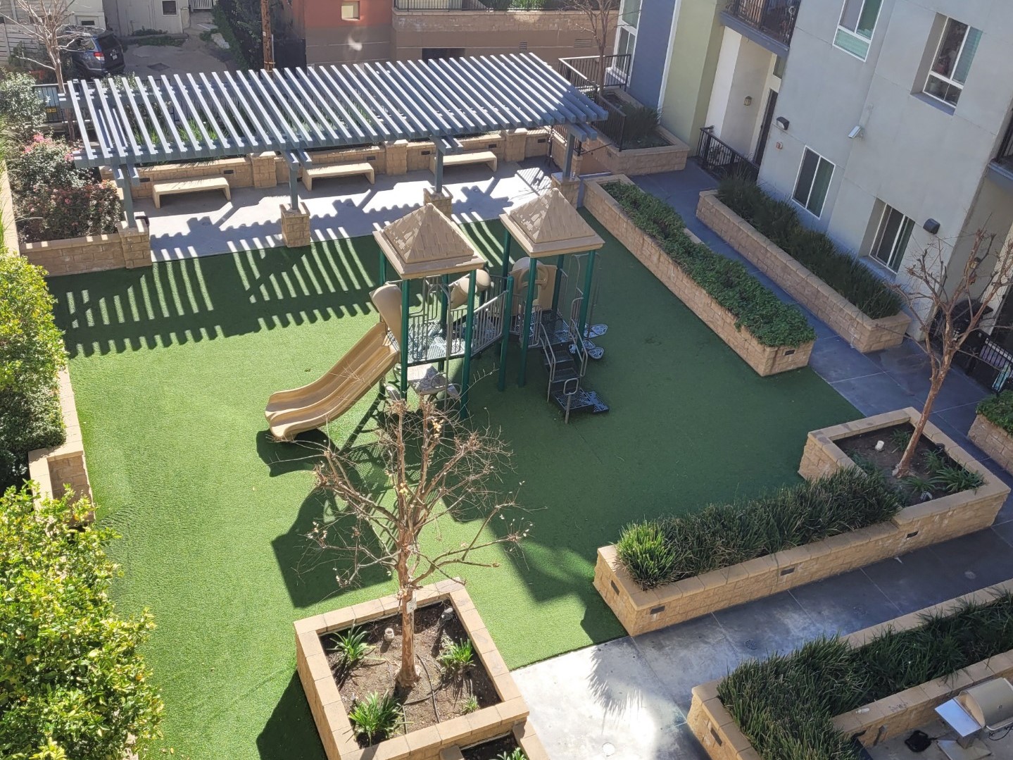 Aerial view of brown and green playground