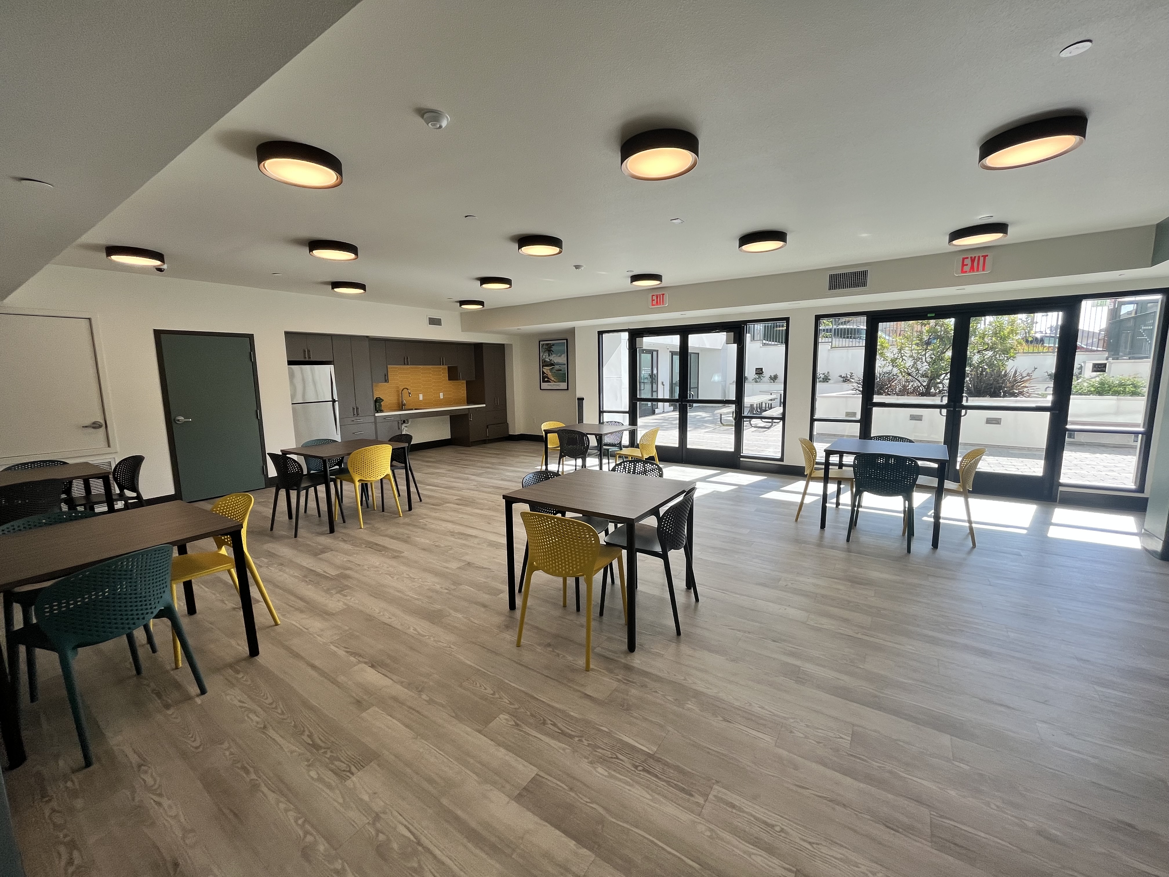 The community room is located on the 1st floor, near the leasing office and the courtyard.
