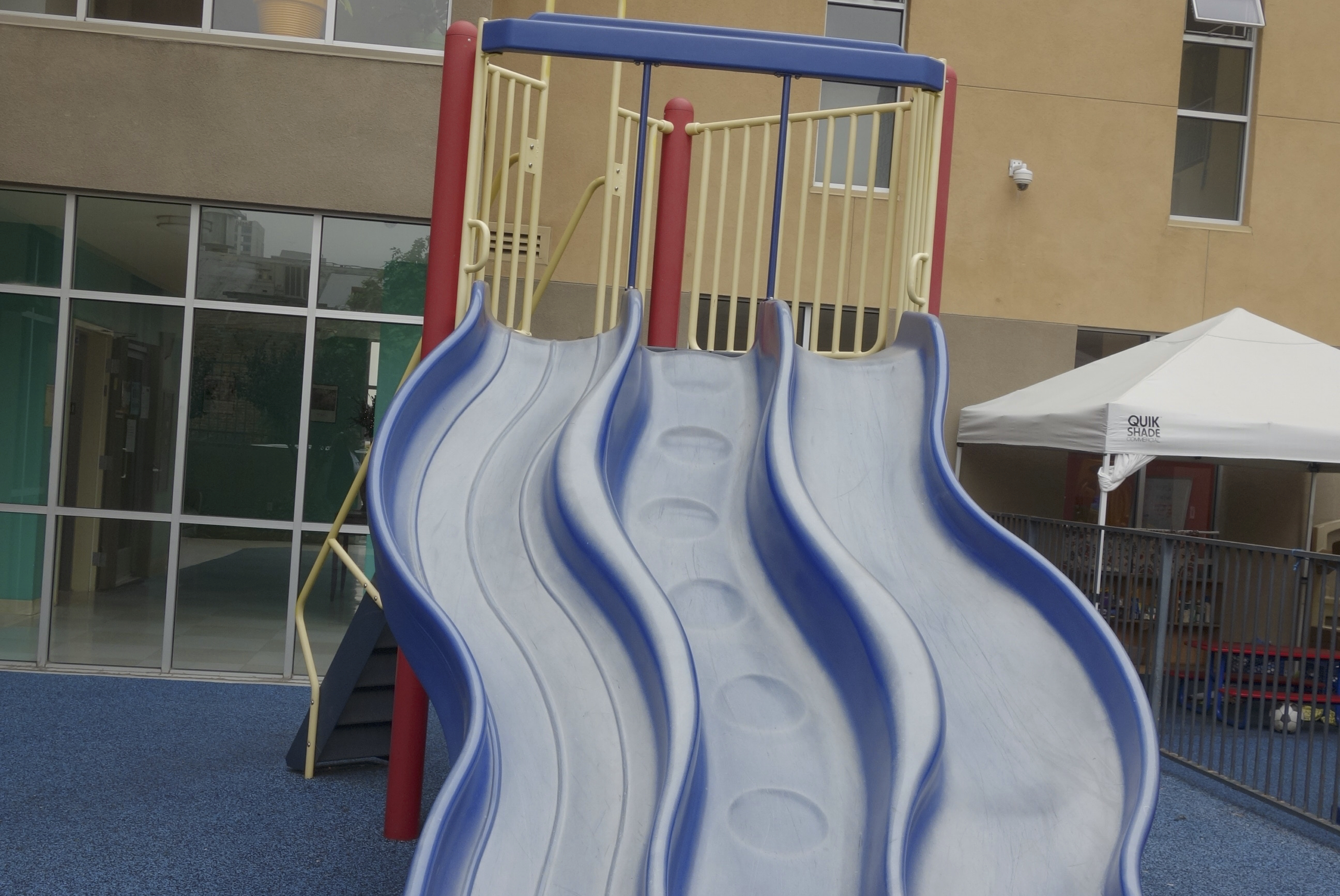 Close up view of a slide at the playground at James Wood Apartments