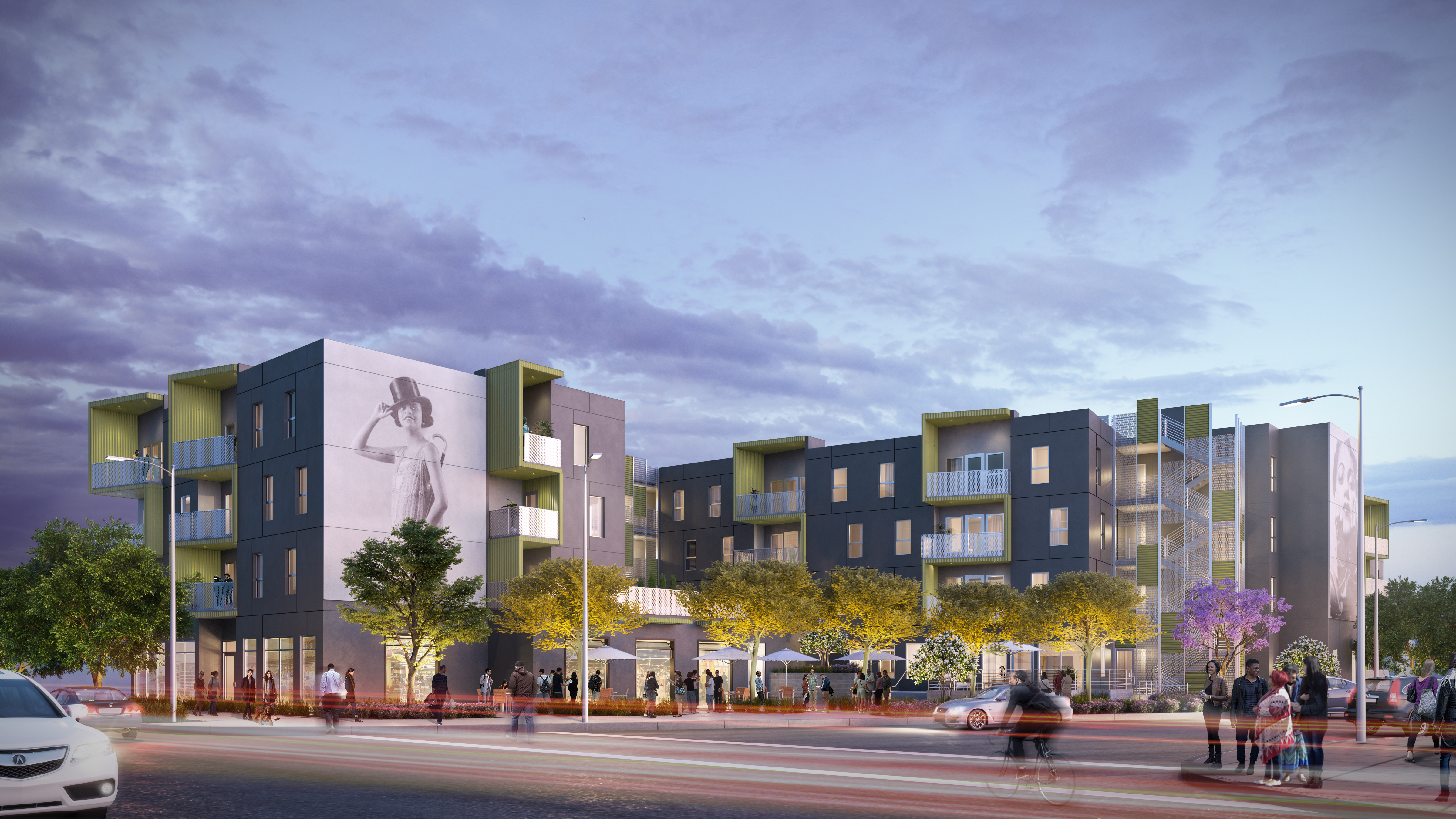Street view of proposed three story project in green and blue color
