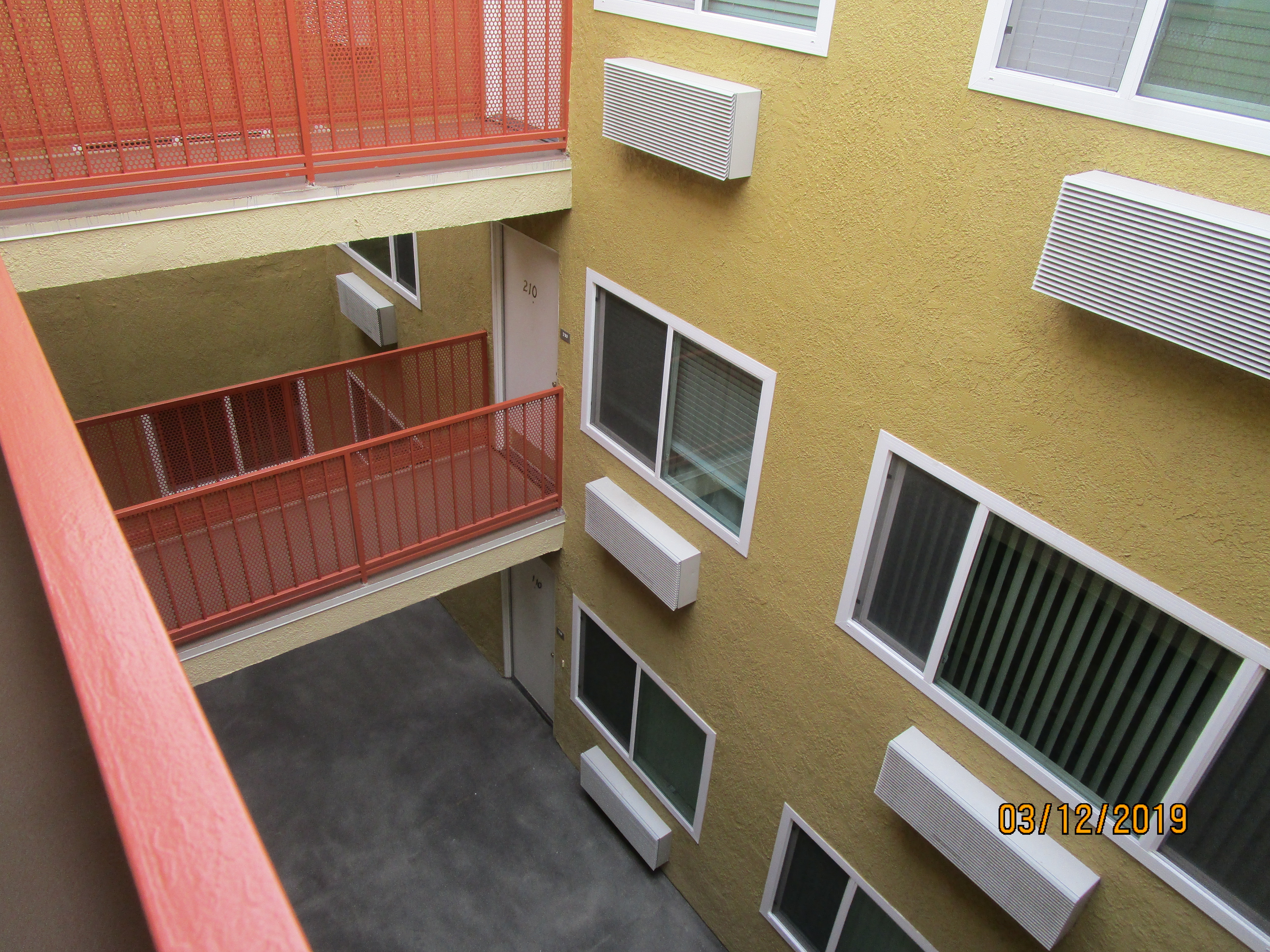 Side view of the patio from an upper floor. multiple units view.