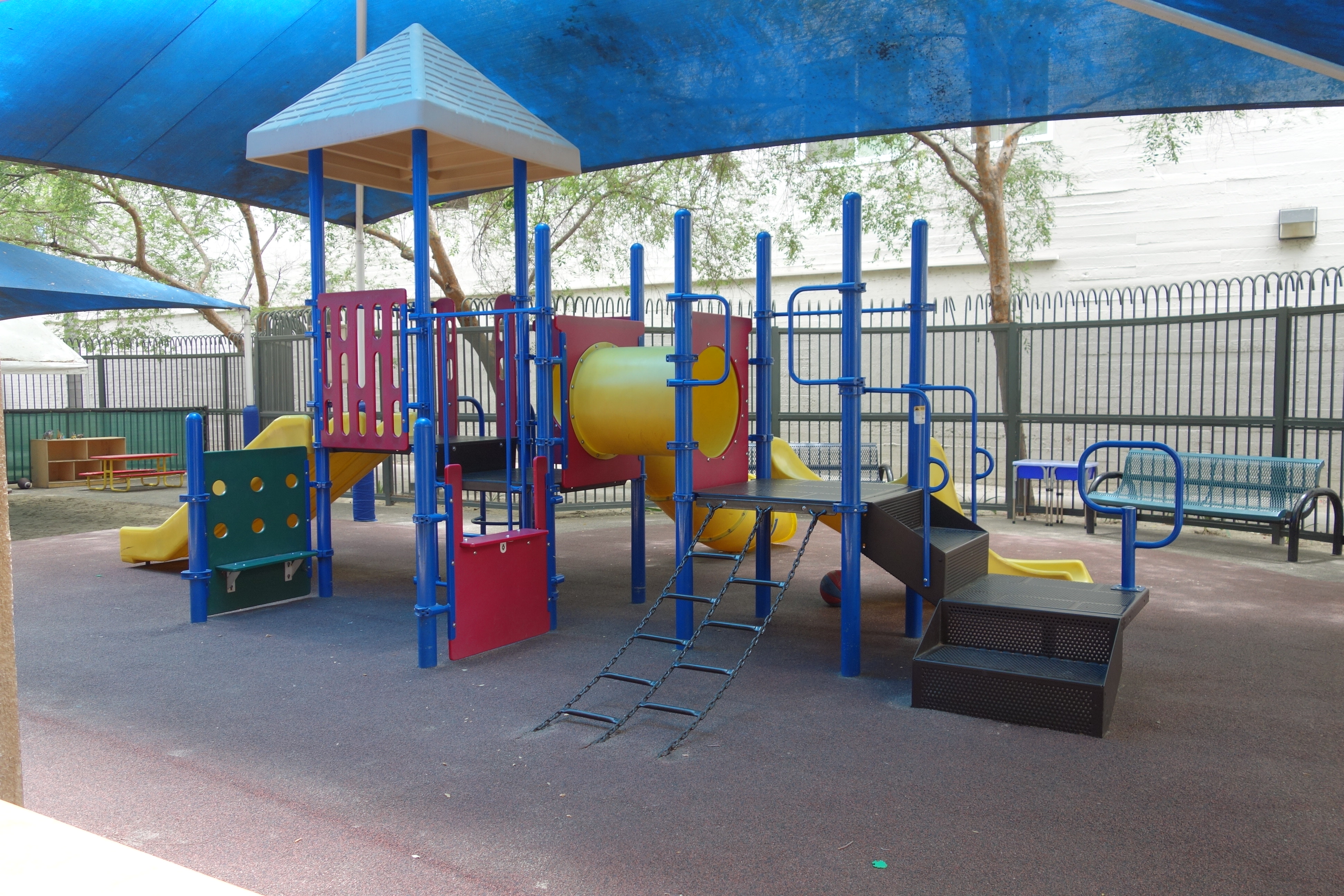 A view of a covered playground area at Hope Village