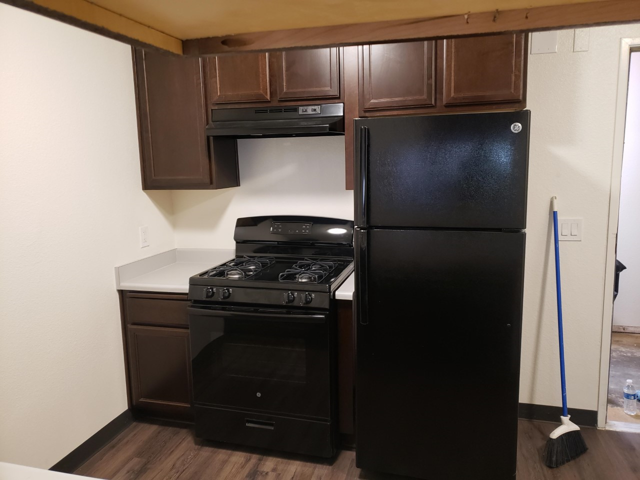 Image of the kitchen equipped with a fridge