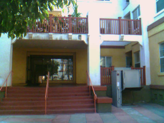 Exterior view of Cambria Apartments showing steps leading up to an entrance
