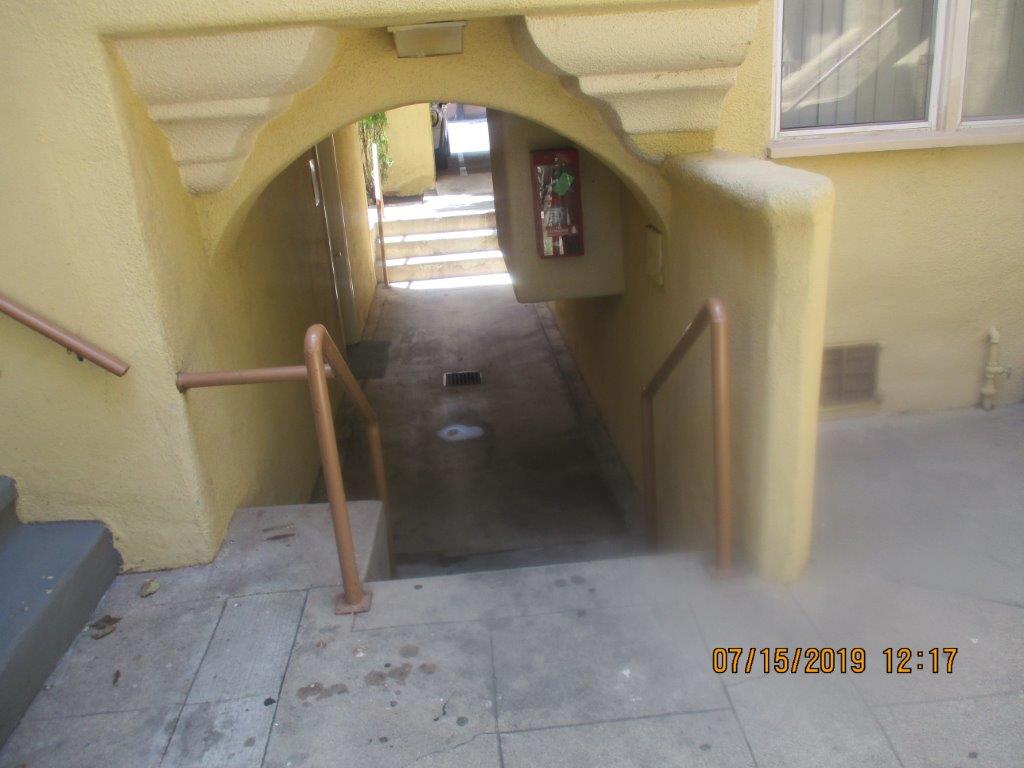 Close up image of stairs leading to the lower level of the property