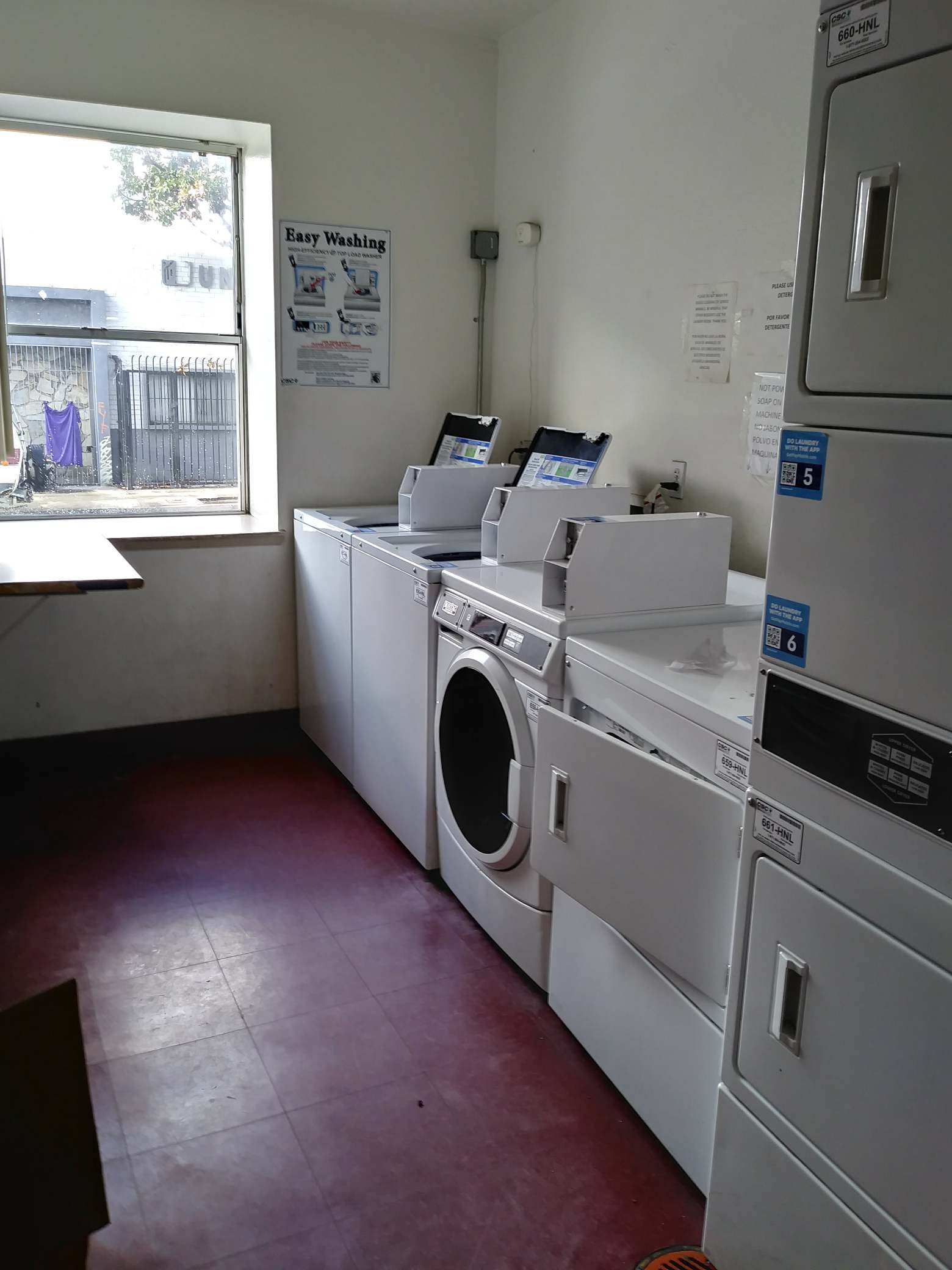 Photo of Laundry Room showing washing machines and heaters