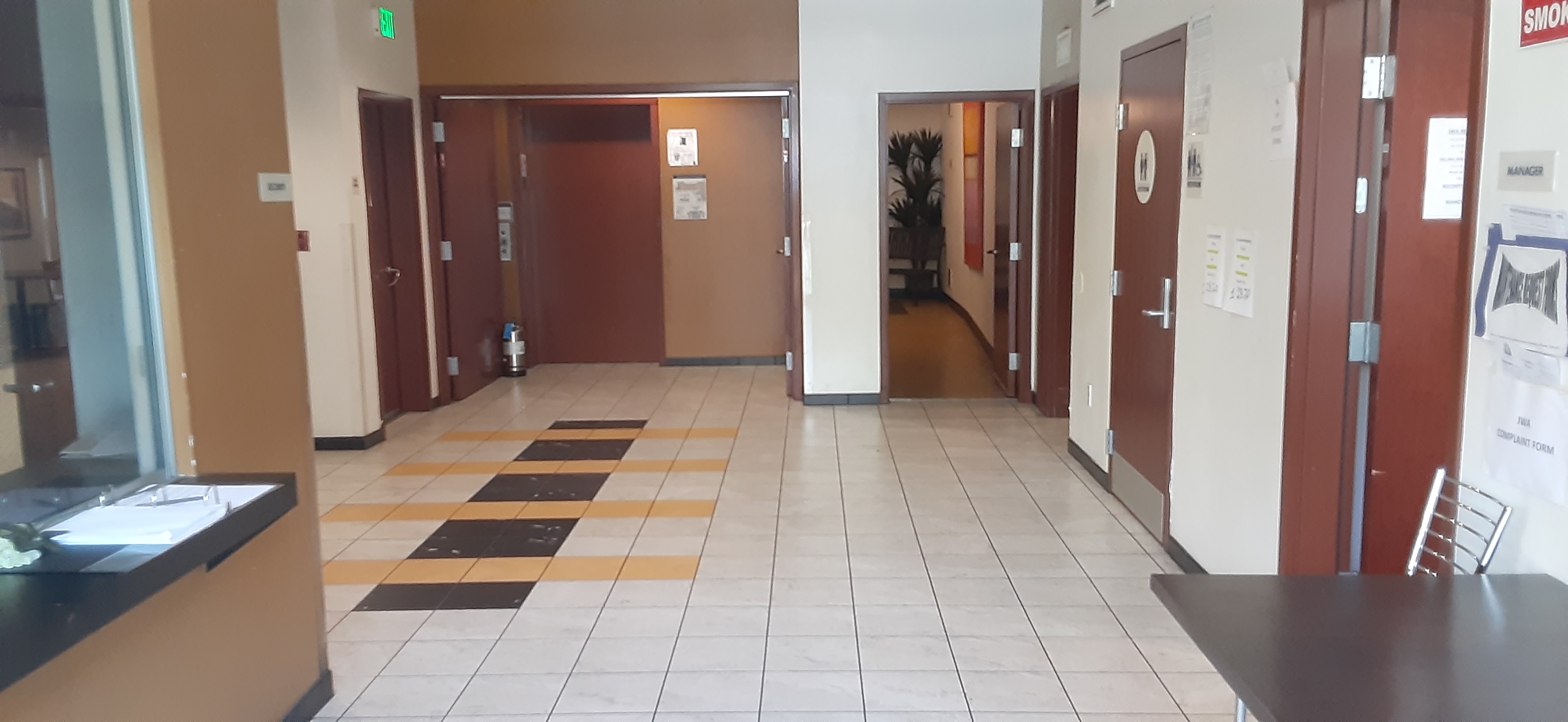 James wood lobby area. lobby area gives access to restroom, receptionist desk, and elevator,