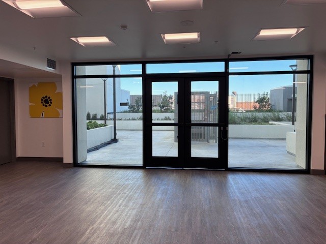 Photo of entrance door from inside the lobby.