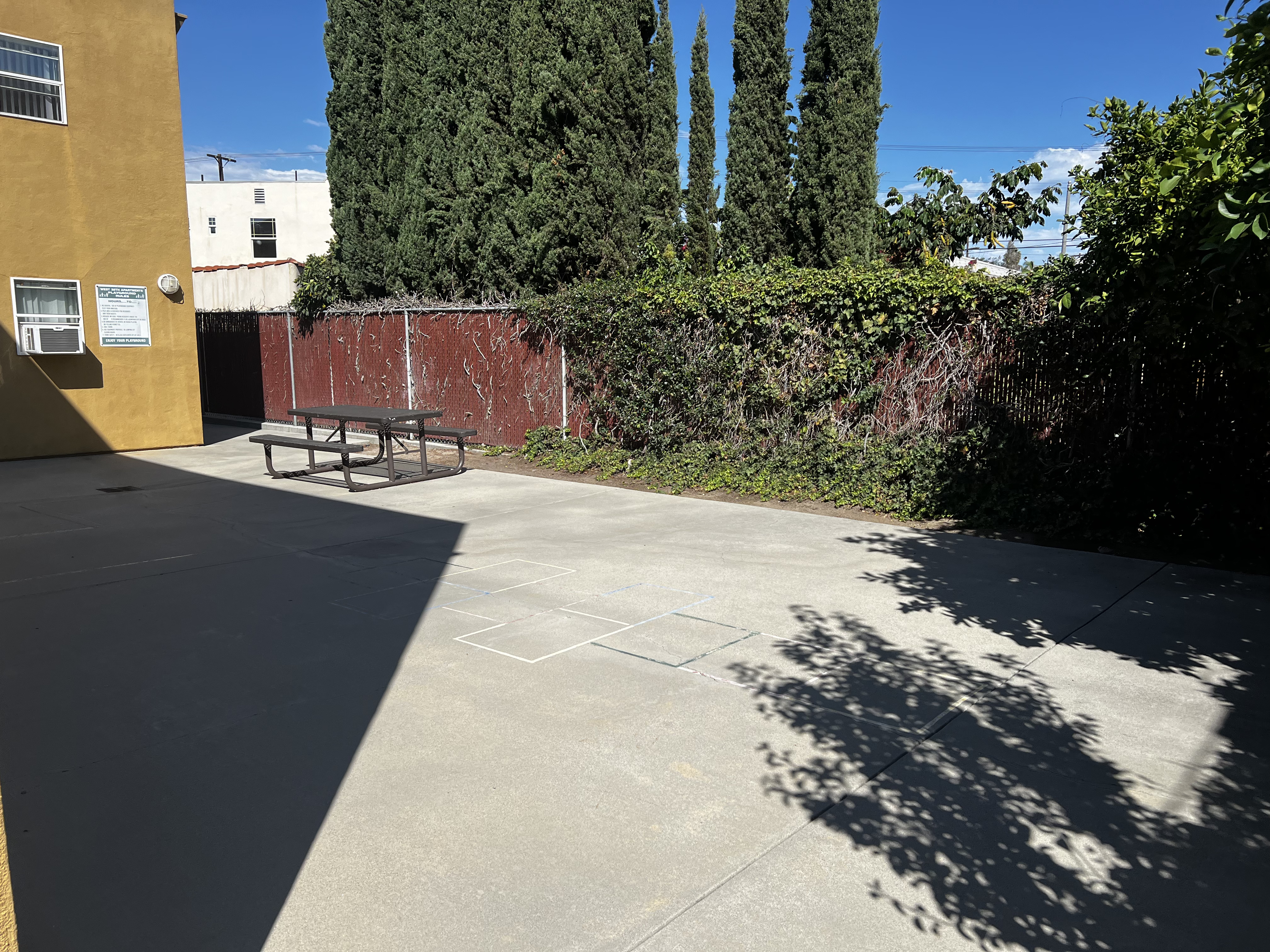 Community outdoor space with one picnic table