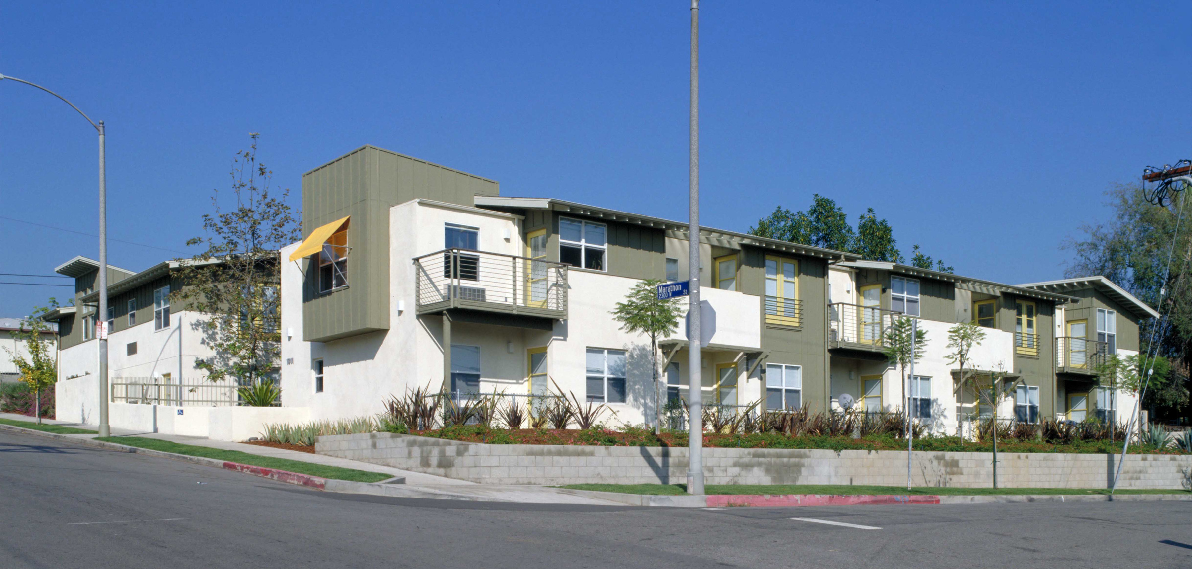 Street view of Waterloo Heights Apartments. The building is on the corner of two streets and street lamp on both sides