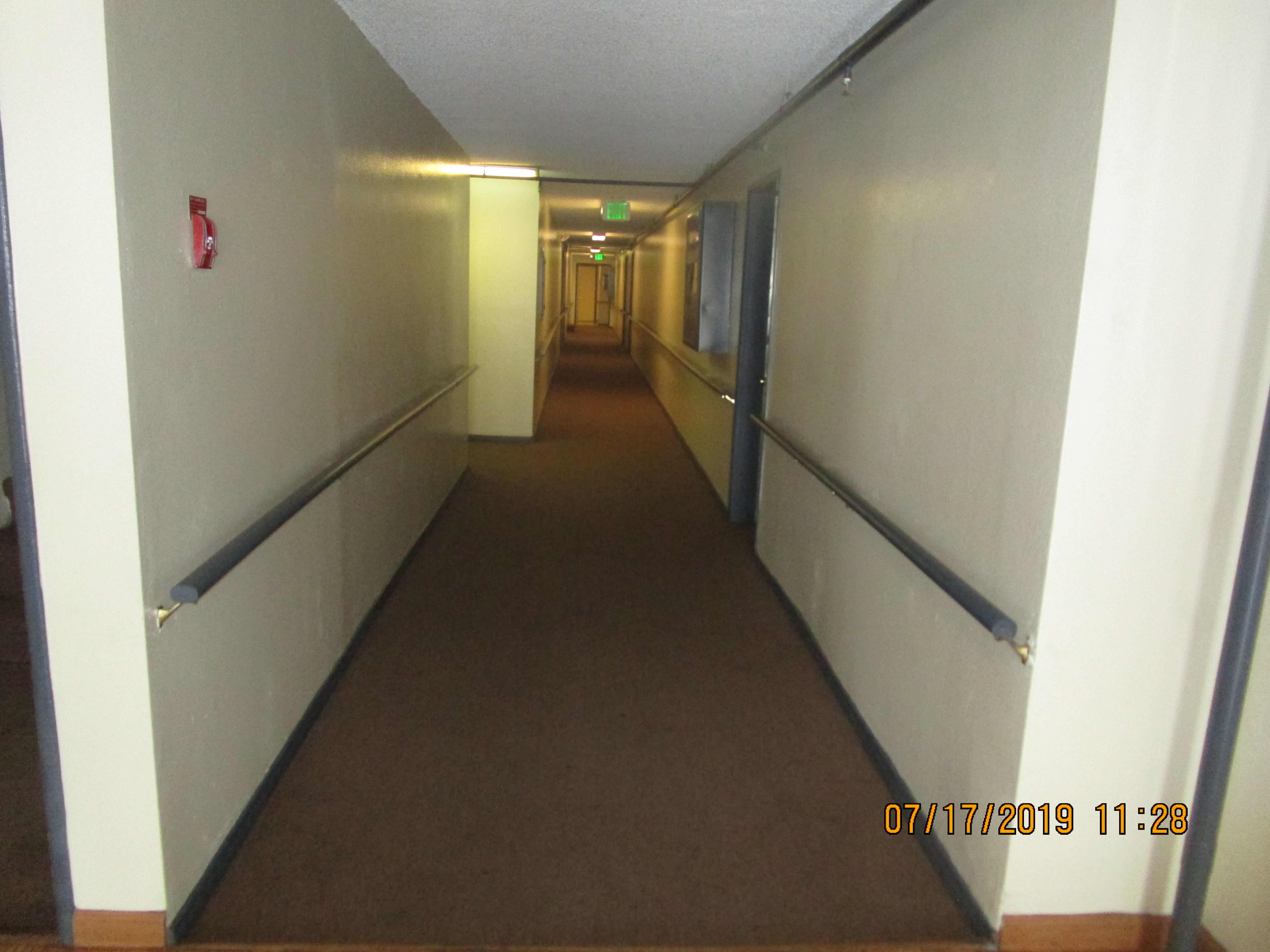 Interior view of a hallway at Leeward A&B Apartments