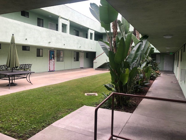 Image of the courtyard of a one story building
