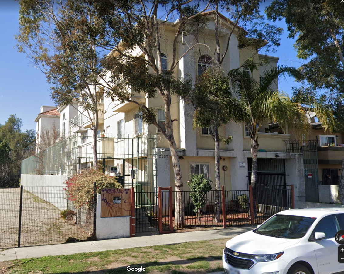 LA Town Homes; Front Entrance; Garage entrance.